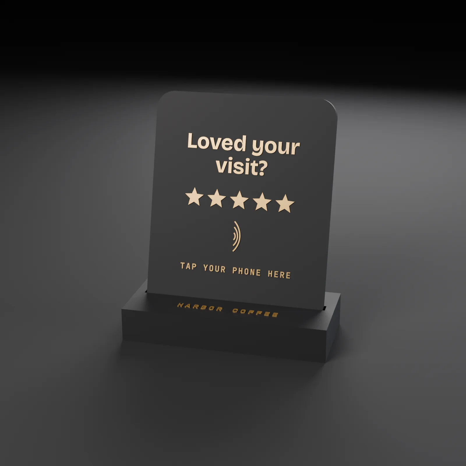 A charcoal review stand: a plate seated in a low base, with Loved your visit?, five stars, a tap mark and Tap your phone here in raised gold, and Harbor Coffee on the base.